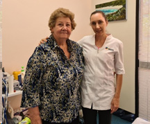 Dr Schiller, chiropractor, with senior patient